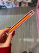 Orange papier pen
